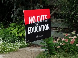 yard sign of No cuts in Detroit
